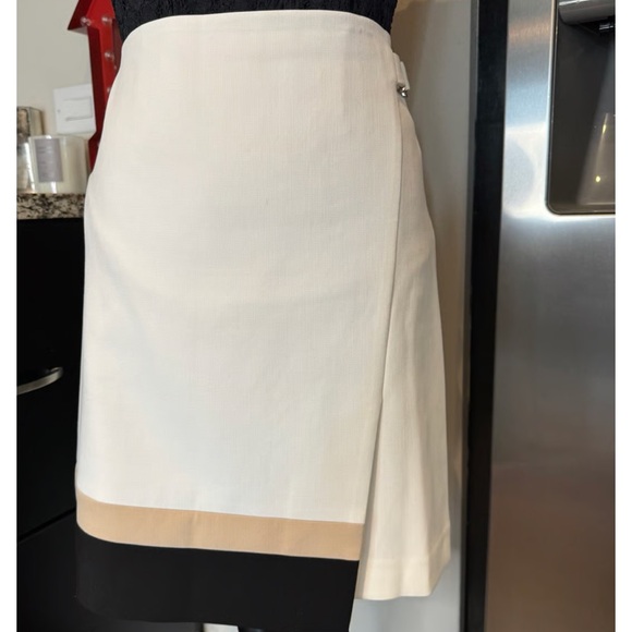 White House Black Market Dresses & Skirts - White House Black Market Elegant Cream and Black Pencil Skirt with wrap feature.